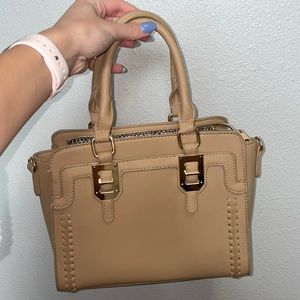 Tan colored small handbag !!